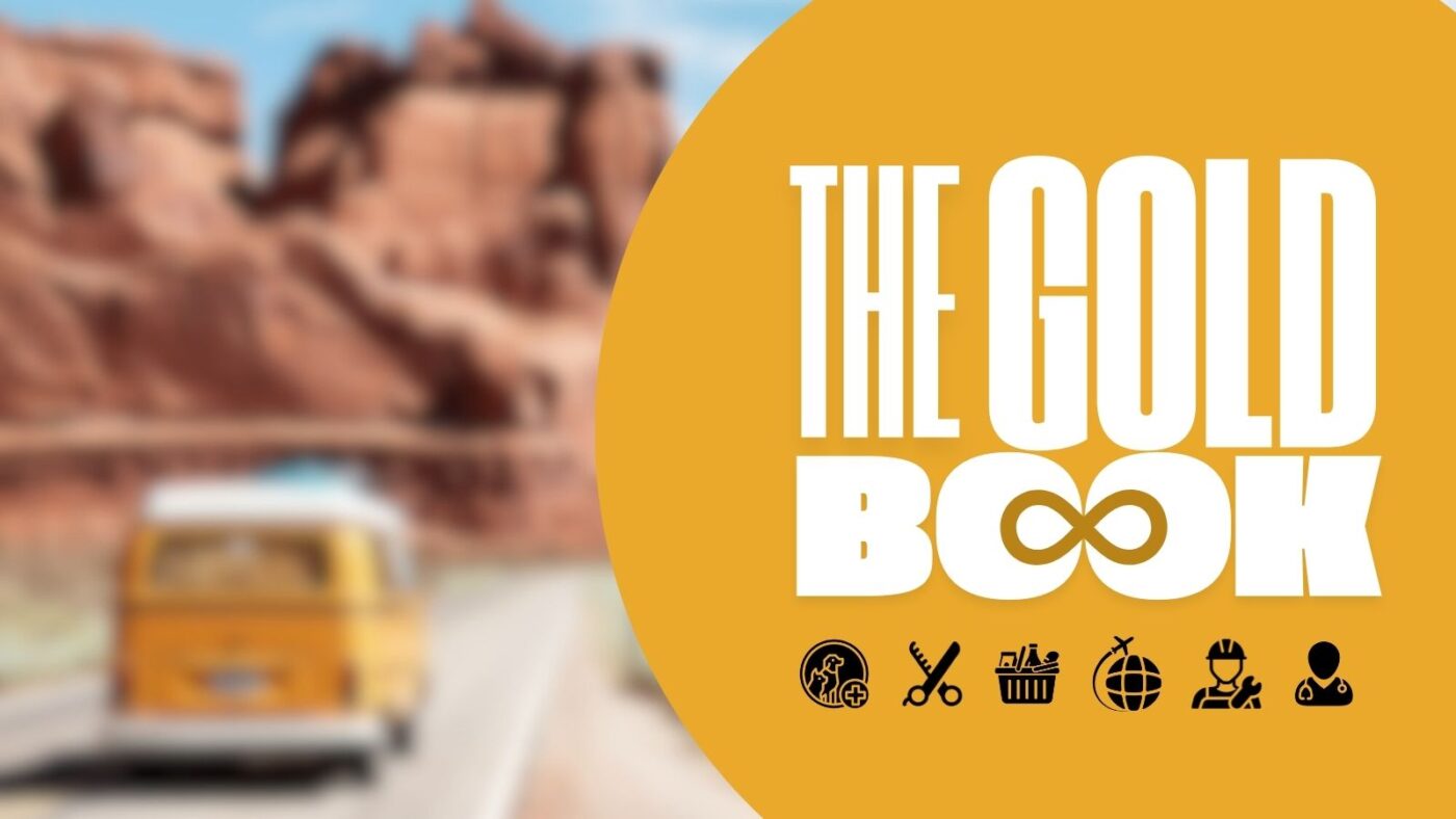 Photo: A blurred photo of a vintage camper van on a road near red rocks. Text: The Gold Book. Icons: various symbols representing goods and services