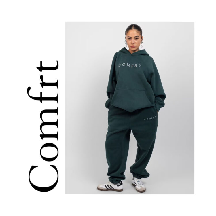 Comfrt hoodie and sweatpants on a posed model (female presenting)